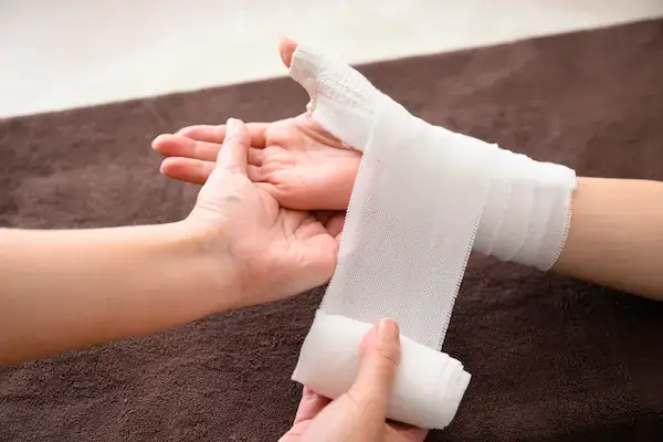 Doctor Wrapping Hand