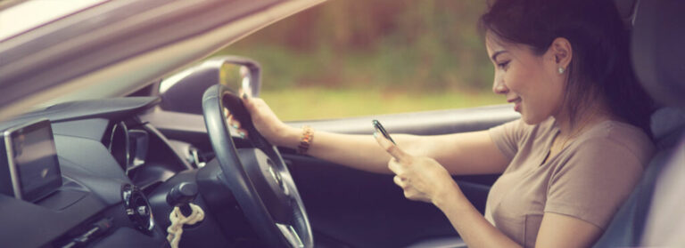 Woman On Phone While Driving