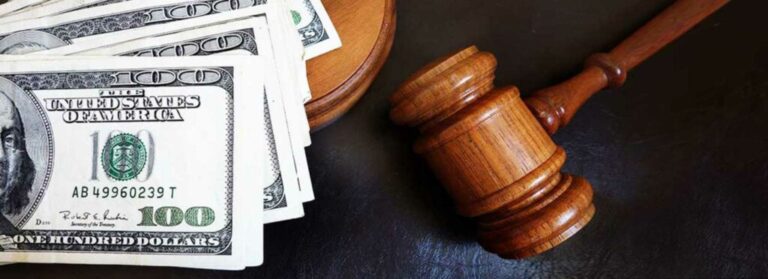 Car Accident Settlement Concept With Money and Gavel