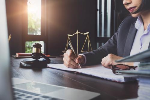 An attorney filing a claim for a client who was in an accident with a speeding driver.