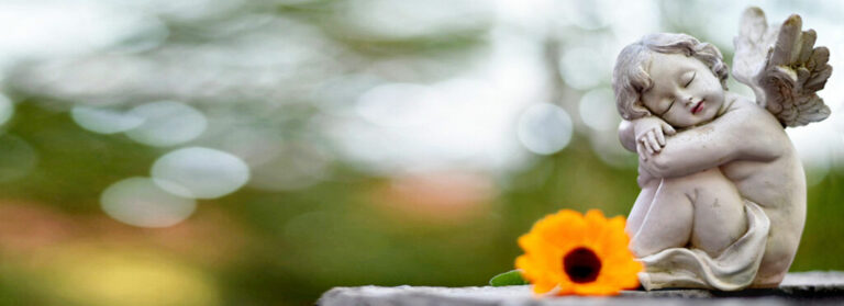 Cherub On Gravestone