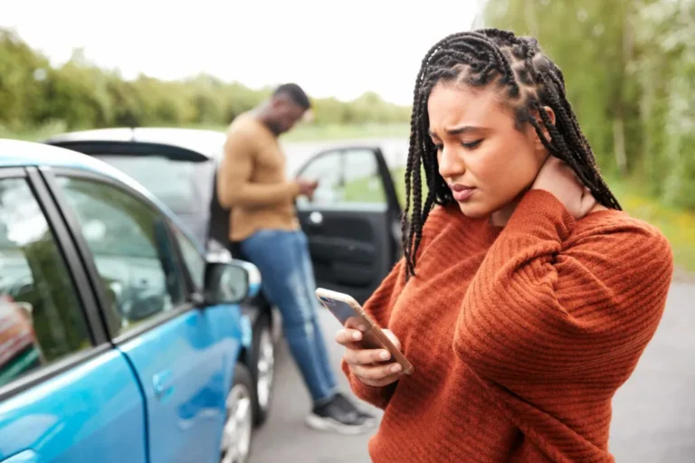 Woman on Phone After Car Accident