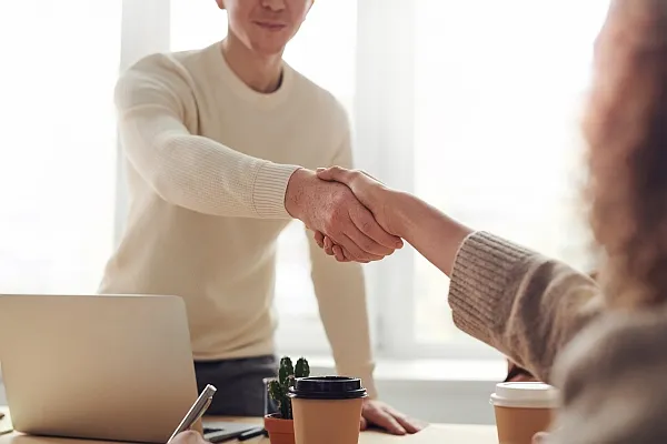 Handshake Between Two People