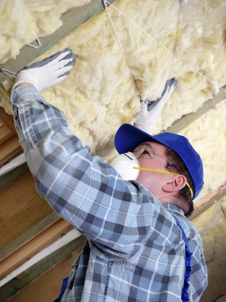 Man working with insulation