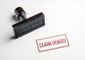 Stamp and the words claim denied